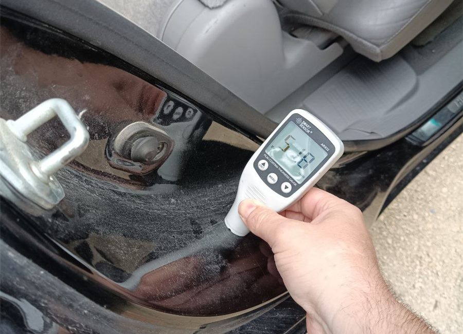 Paint thickness measurement on vehicle door